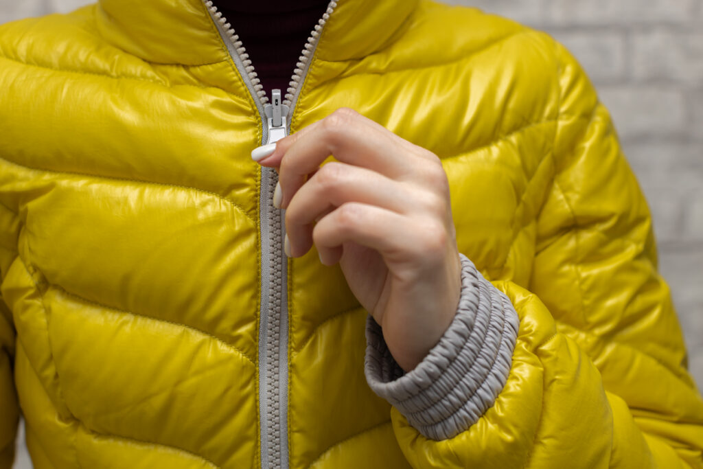 Zipping up a winter coat